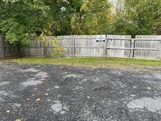 The lawn barber Logo