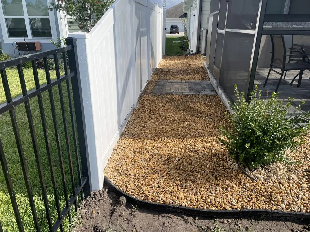 Custom residential landscaping in Palm Coast, FL by The Lawn Barber X