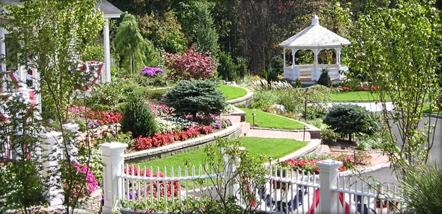 Custom landscaping services for year-round maintenance across Cranston, RI - The Lawn Beauticians