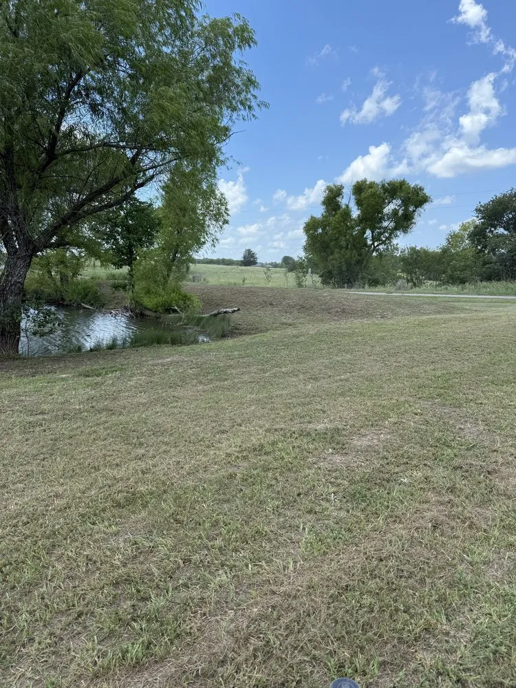 Affordable landscape design for year-round maintenance in Claremore, OK by The Lawn Guru