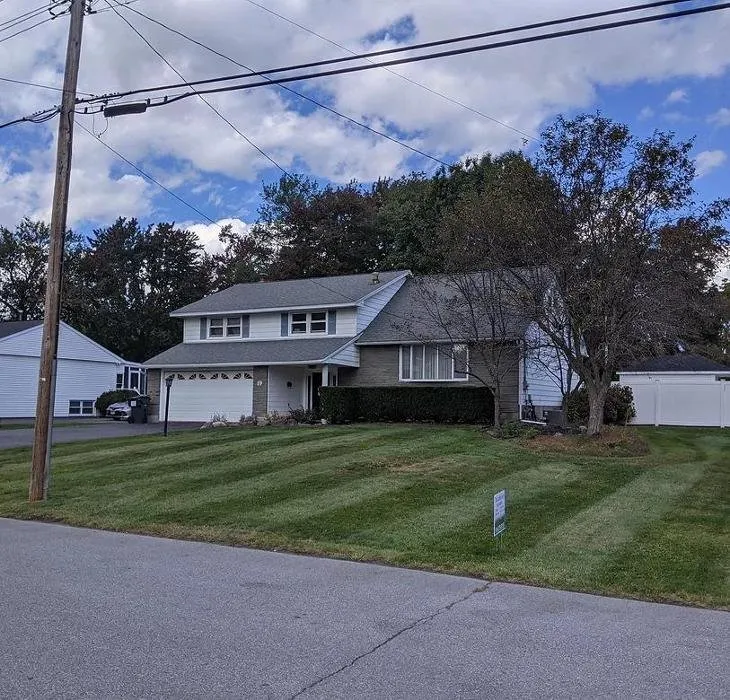 Expert outdoor landscaping with custom design in Schenectady, NY by The Lawn Guys