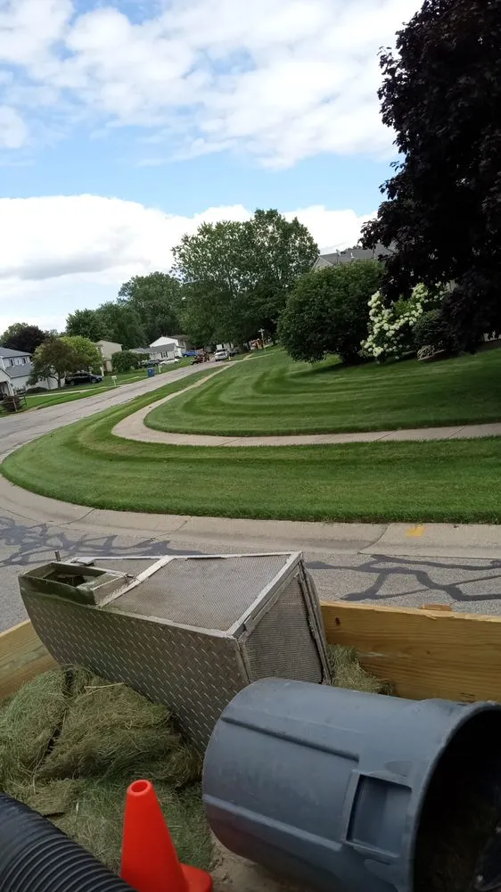 Expert lawn mowing service for homes in Toledo, OH by The Lawn Guyz