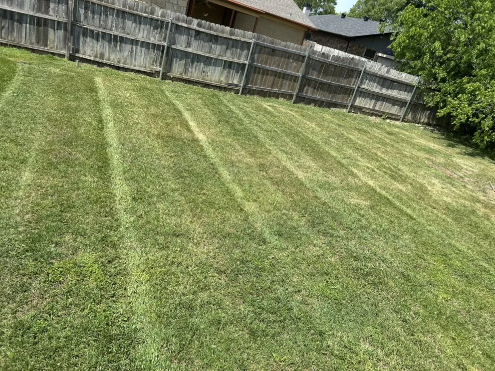 Custom garden landscaping in Watauga, TX by The Lawn Rangers