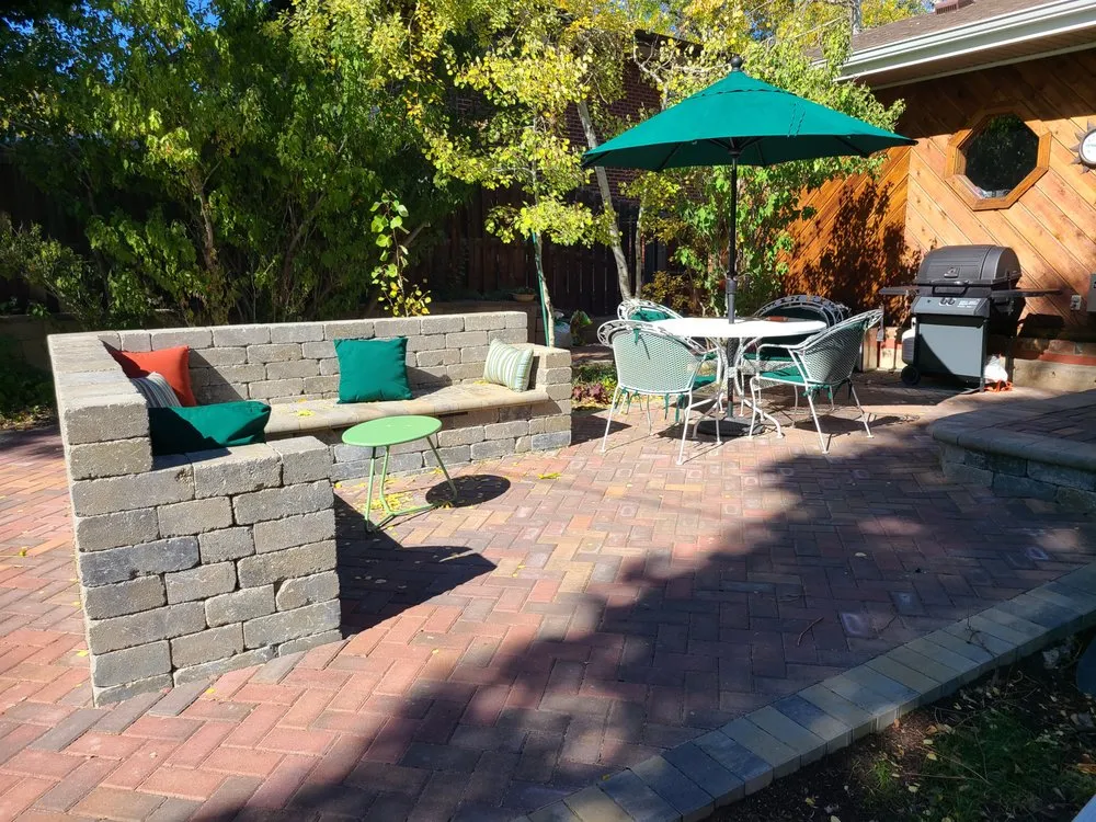 Professional lawn mowing service for homes in Denver, CO by The Little Guy Pavers