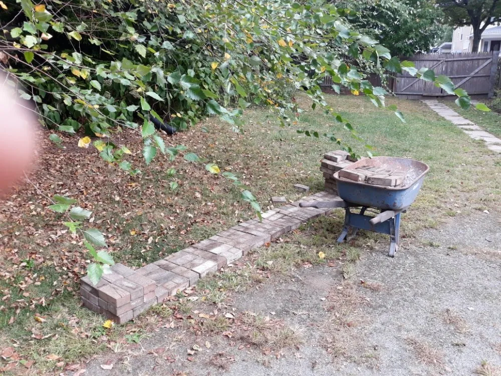 Custom garden landscaping for year-round maintenance in Bloomfield, NJ by The Magnifies landscaping