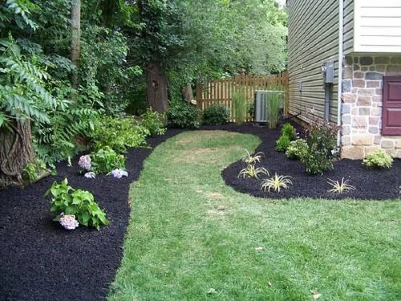 Local yard cleanup service for outdoor upgrades in Greensboro, NC by The Mulch Yard