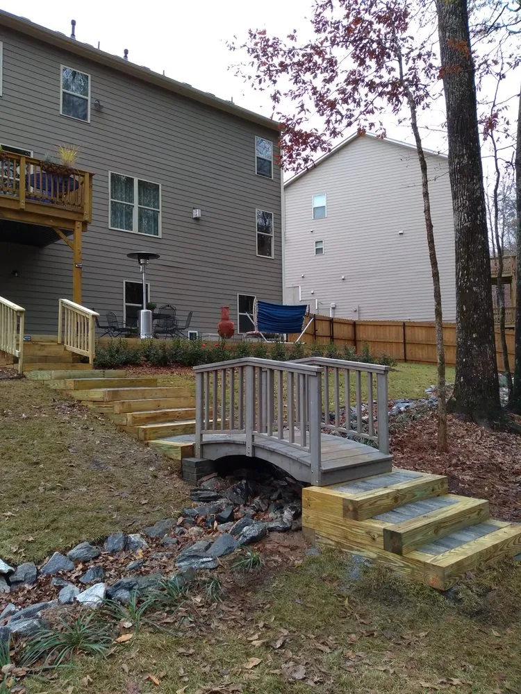 Affordable yard cleanup service for residential properties in Lawrenceville, GA by The Oldowan Paver Company