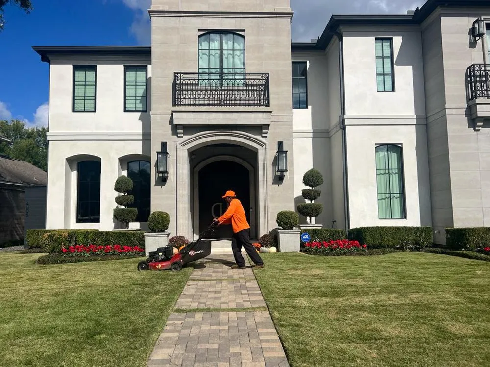 Professional lawn mowing service in Houston, TX by The One Landscaping