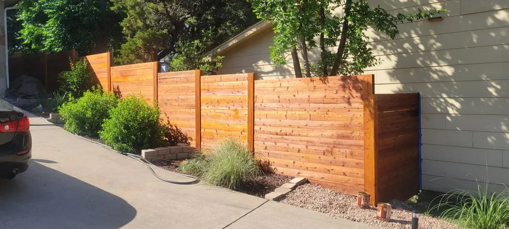 Expert lawn care service in Pflugerville, TX by The Other Side Fence And Yard