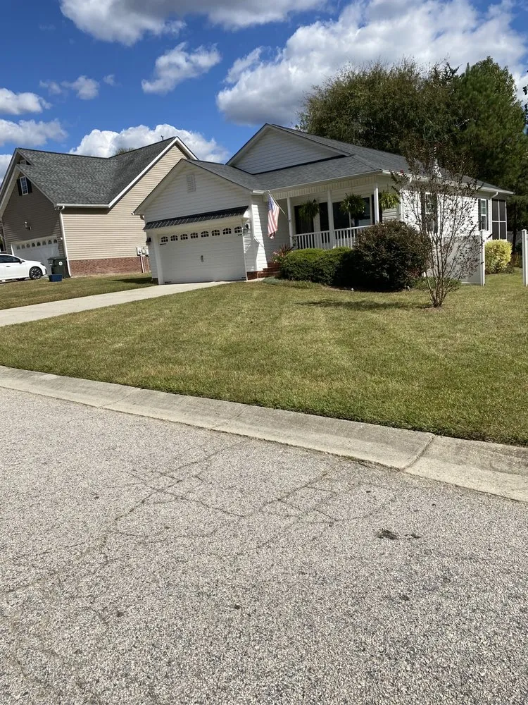 Professional lawn mowing service for residential properties across Clover, SC - The Other Side Lawn Care