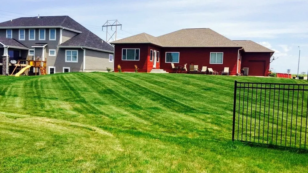 Local lawn mowing service for residential properties across Ankeny, IA - The Otherside Lawn Solutions