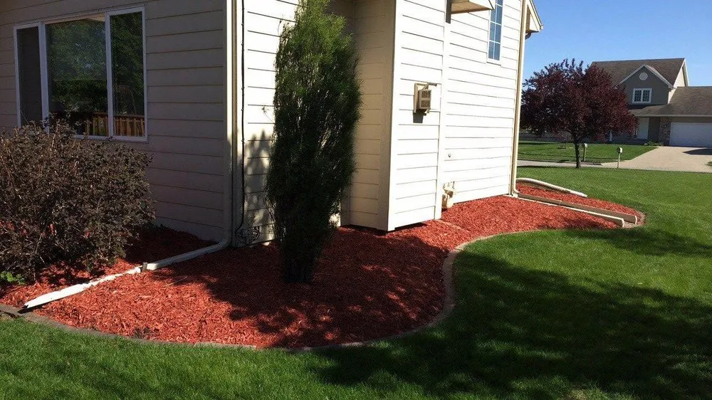 Reliable outdoor landscaping with custom design in Ankeny, IA by The Otherside Lawn Solutions