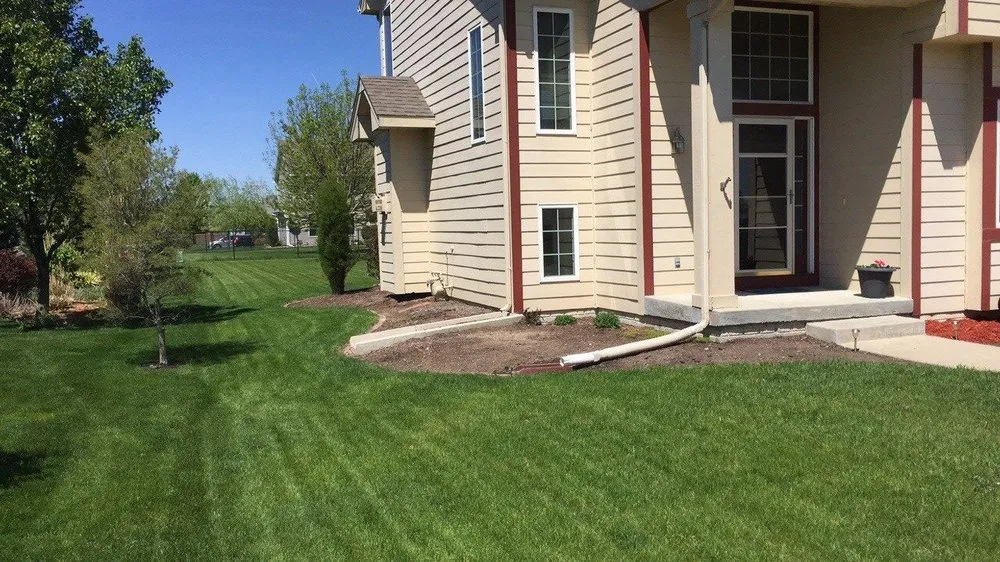 Affordable residential landscaping for homes in Ankeny, IA by The Otherside Lawn Solutions