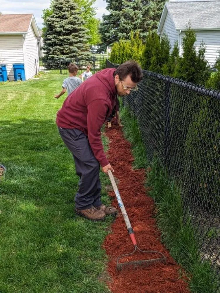 Professional yard maintenance for homes in Bloomington, IL by The Outside Guyz