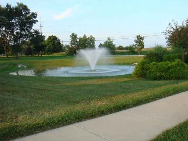 Expert lawn care service for residential properties in Indianapolis, IN by The Peters Group