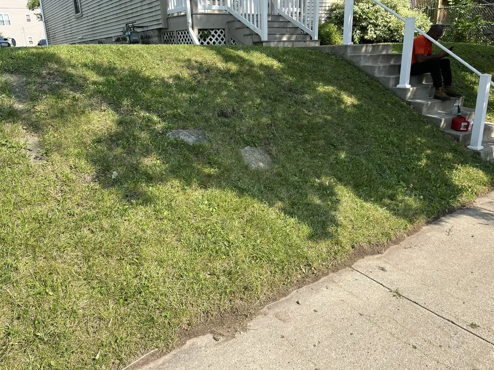 Local lawn mowing service for year-round maintenance in Milwaukee, WI by The Promised Land Lawn And Snow Management