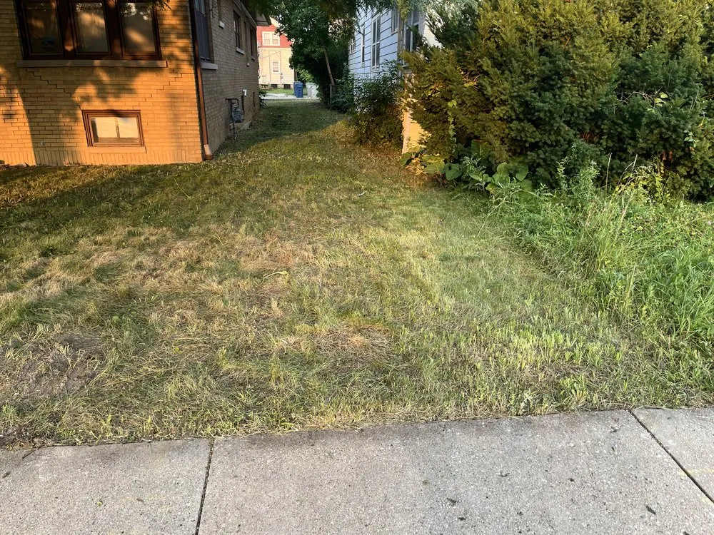 Affordable landscape design in Milwaukee, WI by The Promised Land Lawn And Snow Management