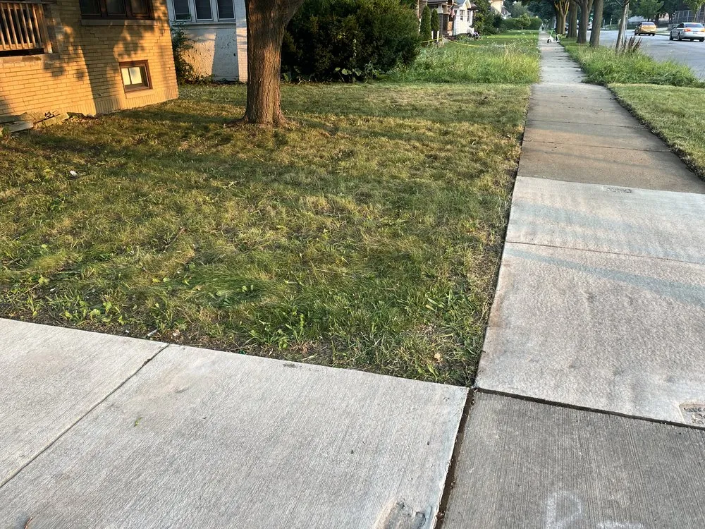 Expert lawn mowing service with custom design across Milwaukee, WI - The Promised Land Lawn And Snow Management