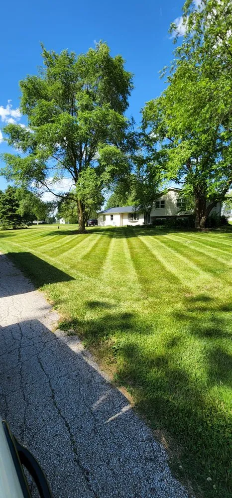 Custom landscape installation in East Dundee, IL by The Ramos Lawn Care Service