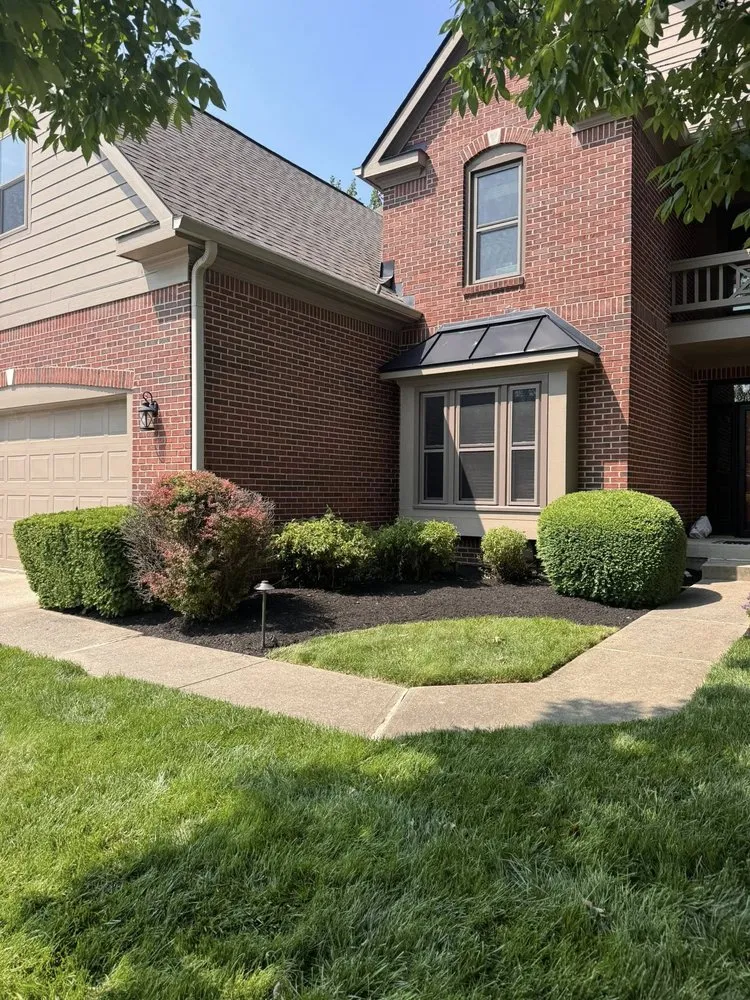 Custom landscape installation for year-round maintenance in Indianapolis, IN by The Rayman