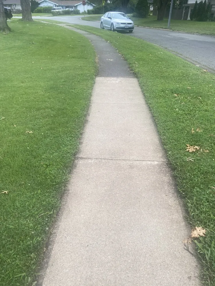 Top-rated lawn care service with custom design across Independence, MO - The Right Services