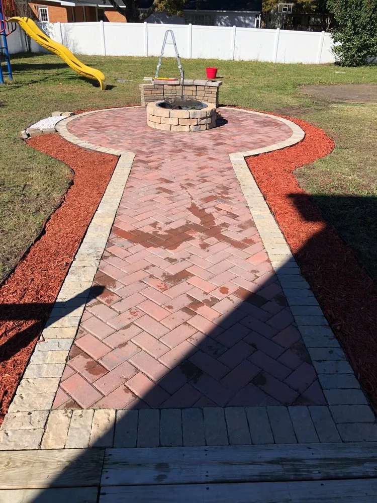 Professional landscape installation for year-round maintenance across Newport News, VA - The Rock Lawn Care