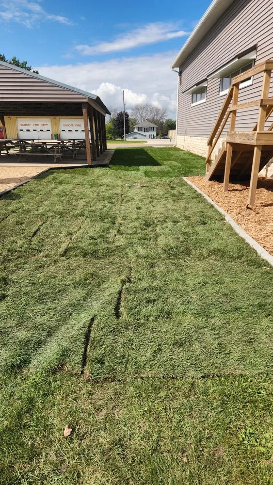 Custom residential landscaping for year-round maintenance in Spring Valley, MN by The Rustic Rose Lawn and Landscape