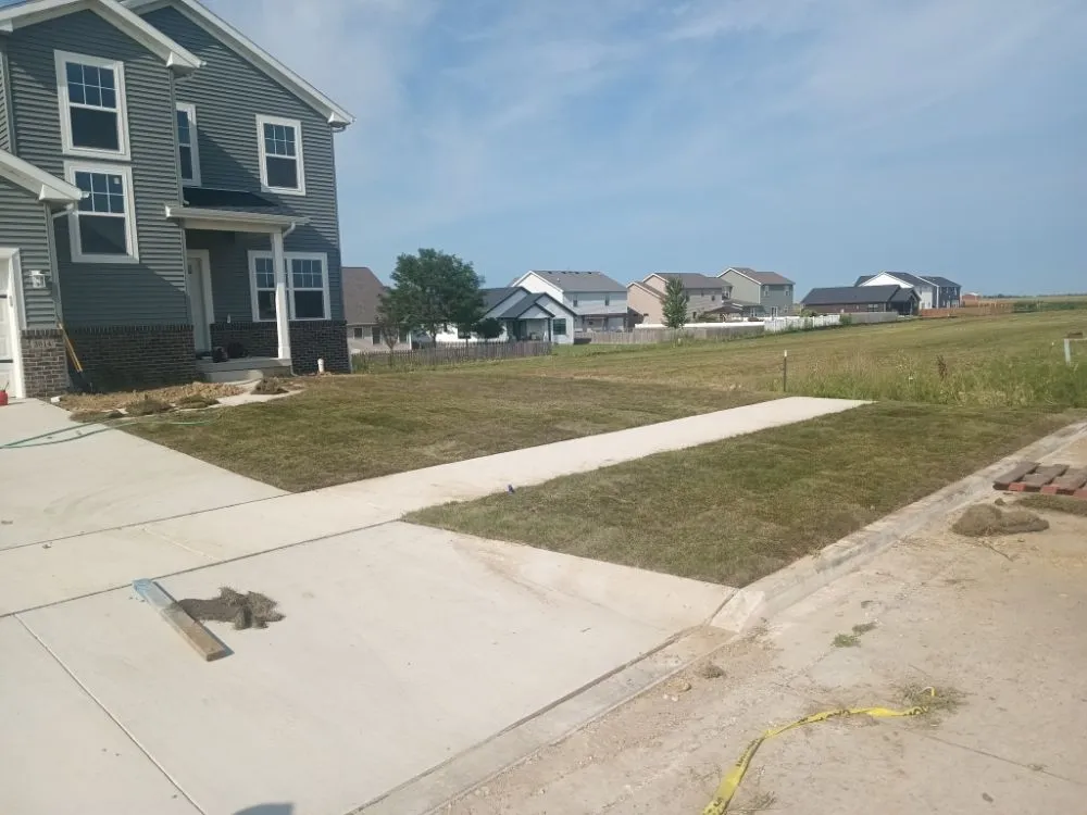 Affordable yard cleanup service for residential properties across Bloomington, IL - The Sod Father