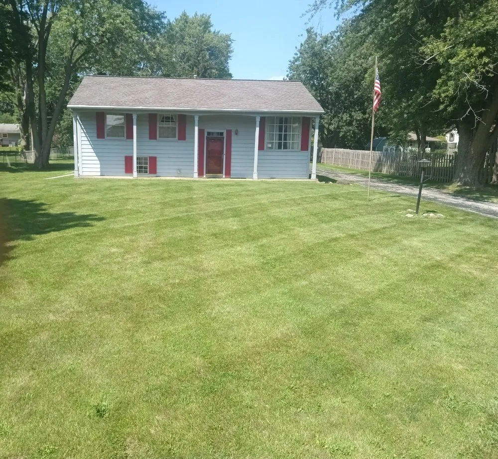 Affordable yard cleanup service for homes in Bloomington, IL by The Sod Father