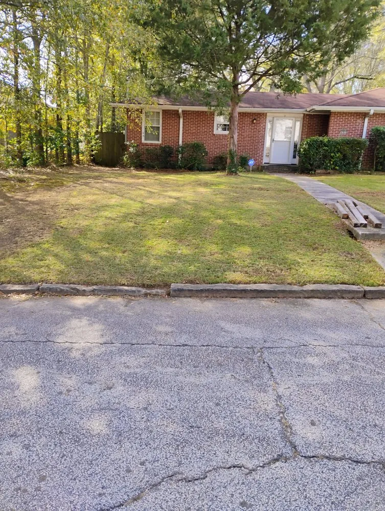 Expert lawn care service for homes in Lithonia, GA by The Stephens Bros Lawn Care Service