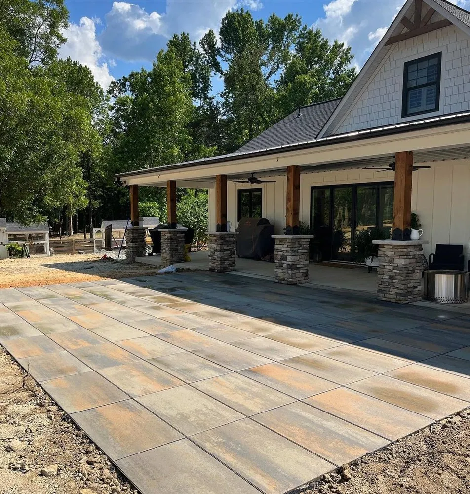 Professional yard maintenance for year-round maintenance in Concord, NC by The Stone Group Outdoor Specialist