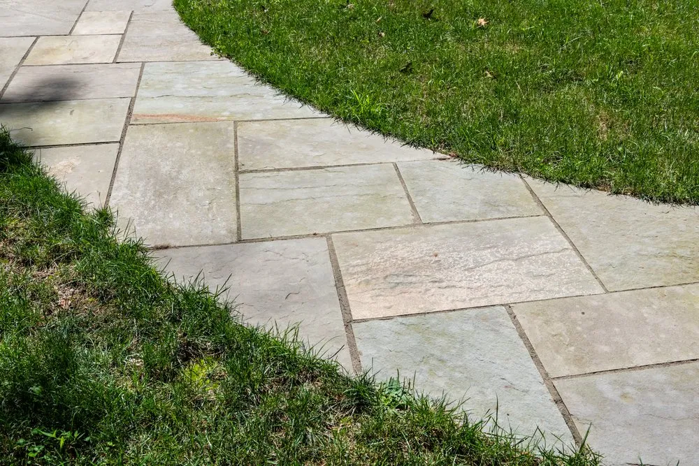 Custom yard cleanup service with custom design in Killingworth, CT by The StoneScape Company