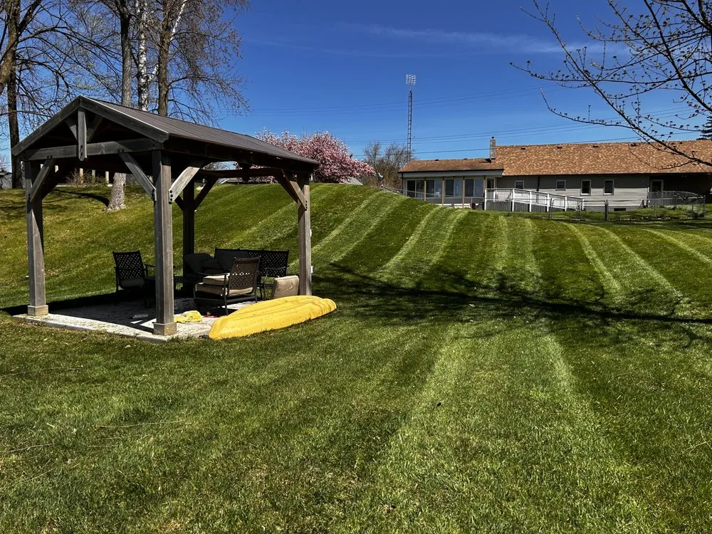 Expert lawn mowing service for residential properties across Millington, MI - The Three Amigos Lawncare
