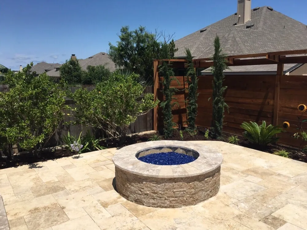 Affordable lawn care service with custom design in San Antonio, TX by The Whole 9 Yards