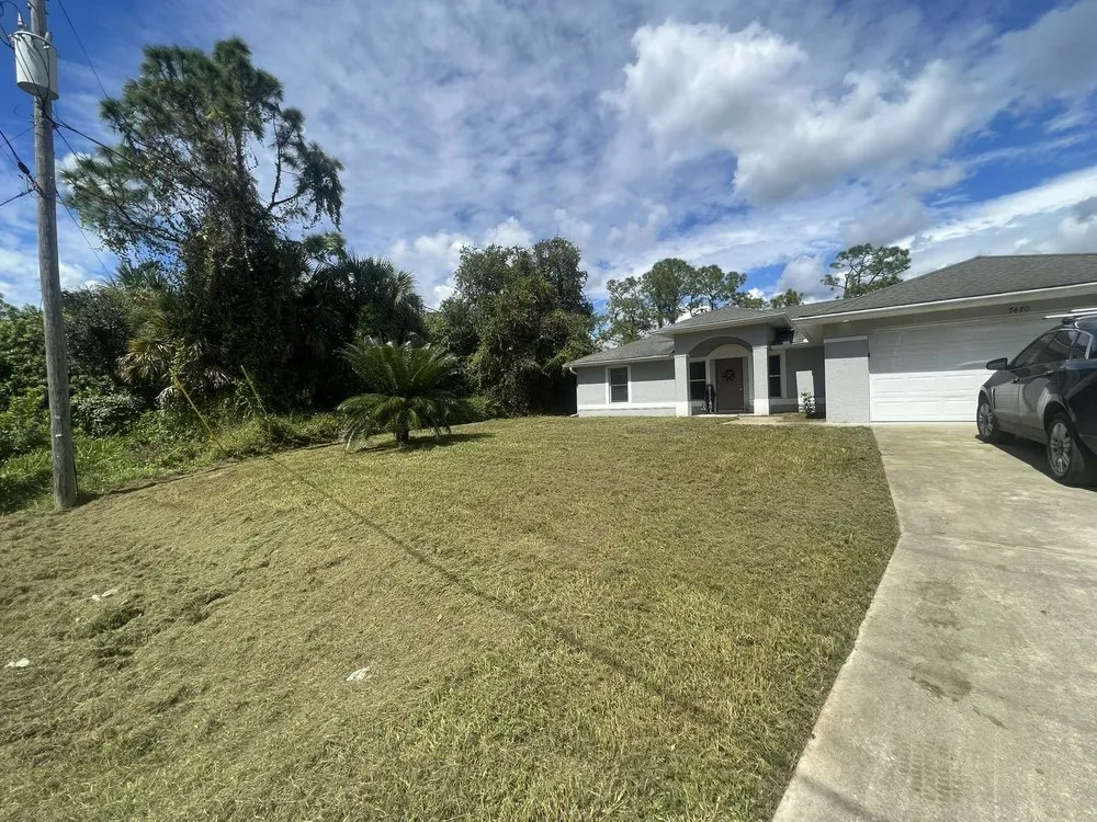 Local outdoor landscaping with custom design across Port Charlotte, FL - The Wizard of Lawns