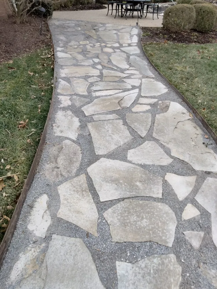 Professional garden landscaping for year-round maintenance in Louisville, KY by The wright out door service's