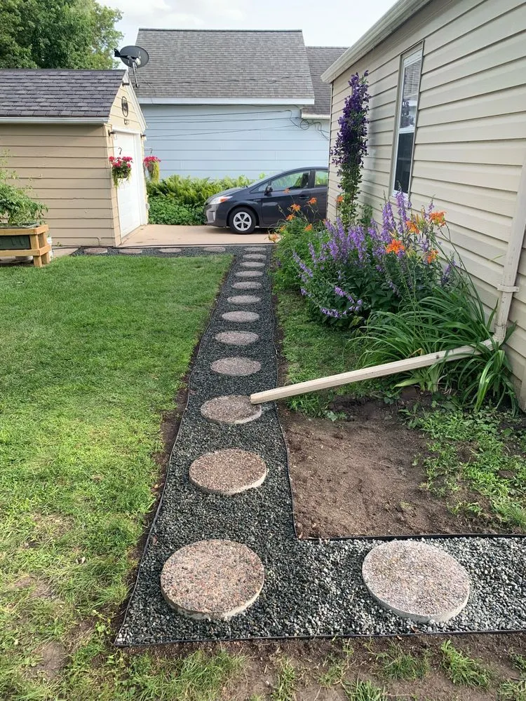 Affordable lawn mowing service for homes in Fergus Falls, MN by The Yard Crew