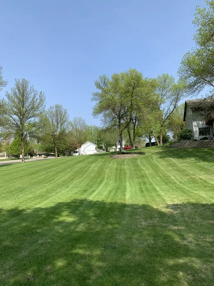 Professional lawn mowing service with custom design across Fergus Falls, MN - The Yard Crew