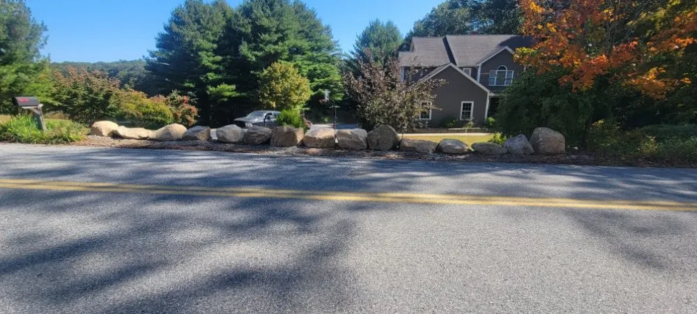 Expert yard cleanup service with custom design across Montville, CT - Thibeault & Sons Property Maintenance