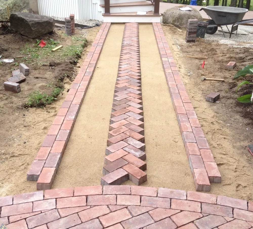 Professional lawn care service for year-round maintenance across Kennebunkport, ME - Thibodeau Landscaping