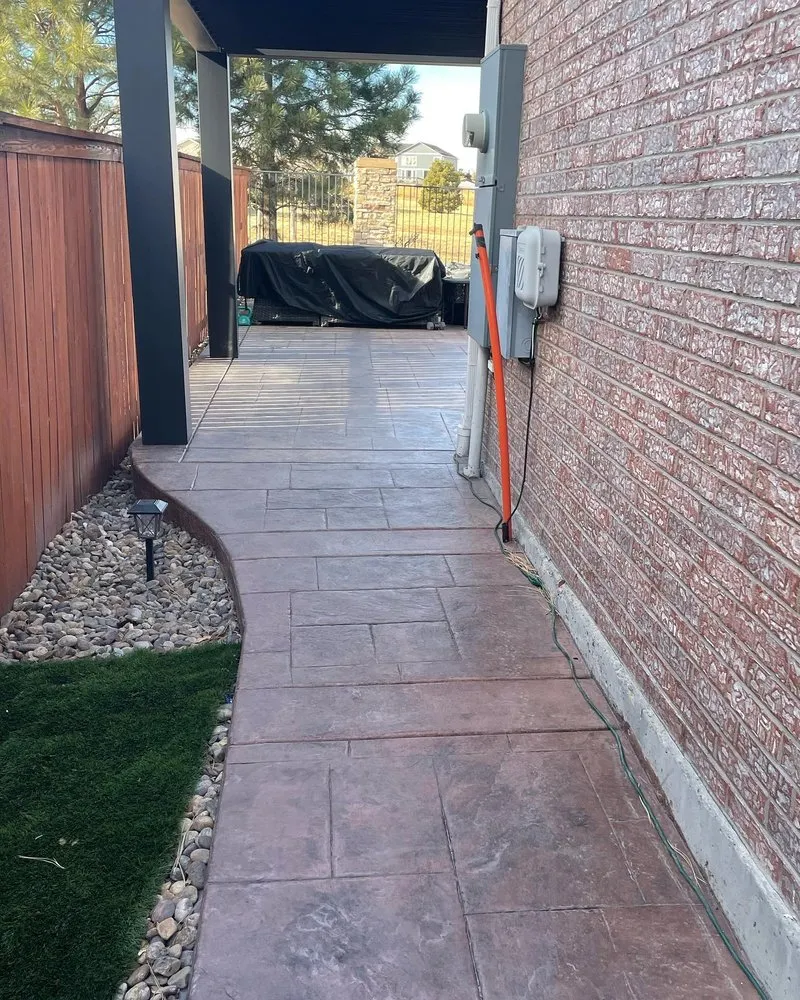Professional landscape installation with custom design across Aurora, CO - This & That Property Services