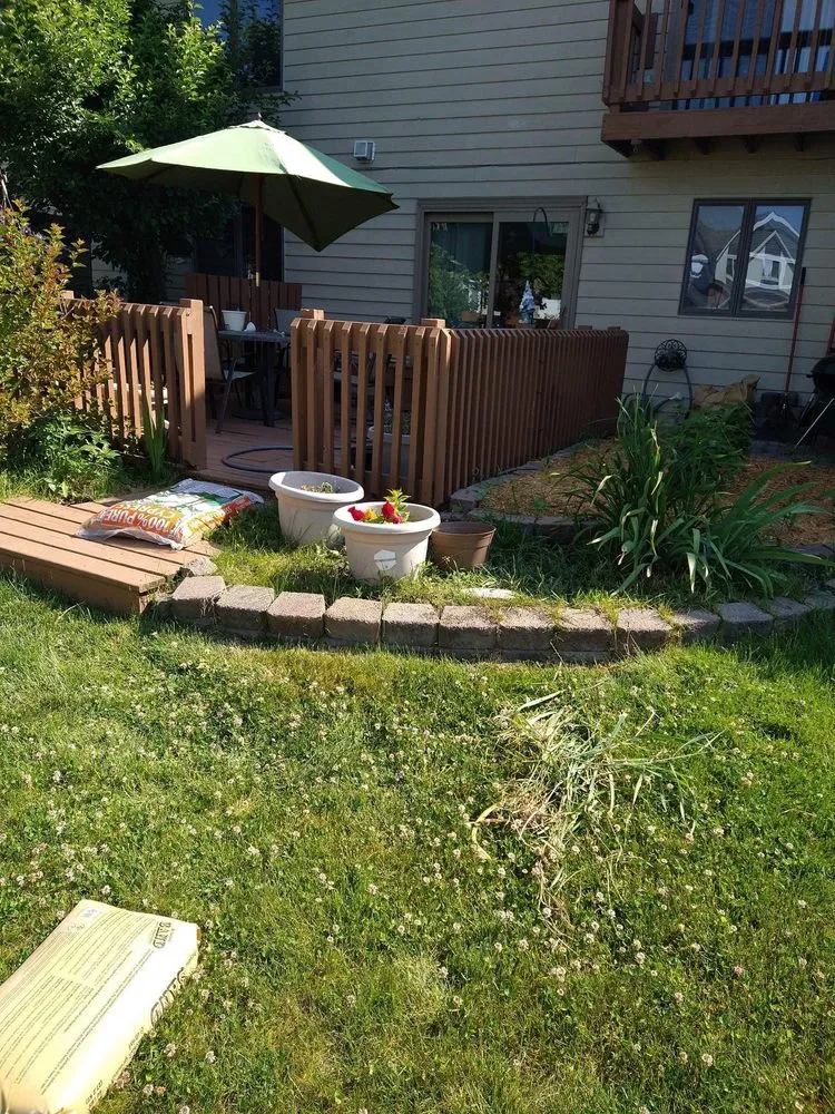 Professional lawn mowing service in Lake Station, IN by This & That Property Solutions