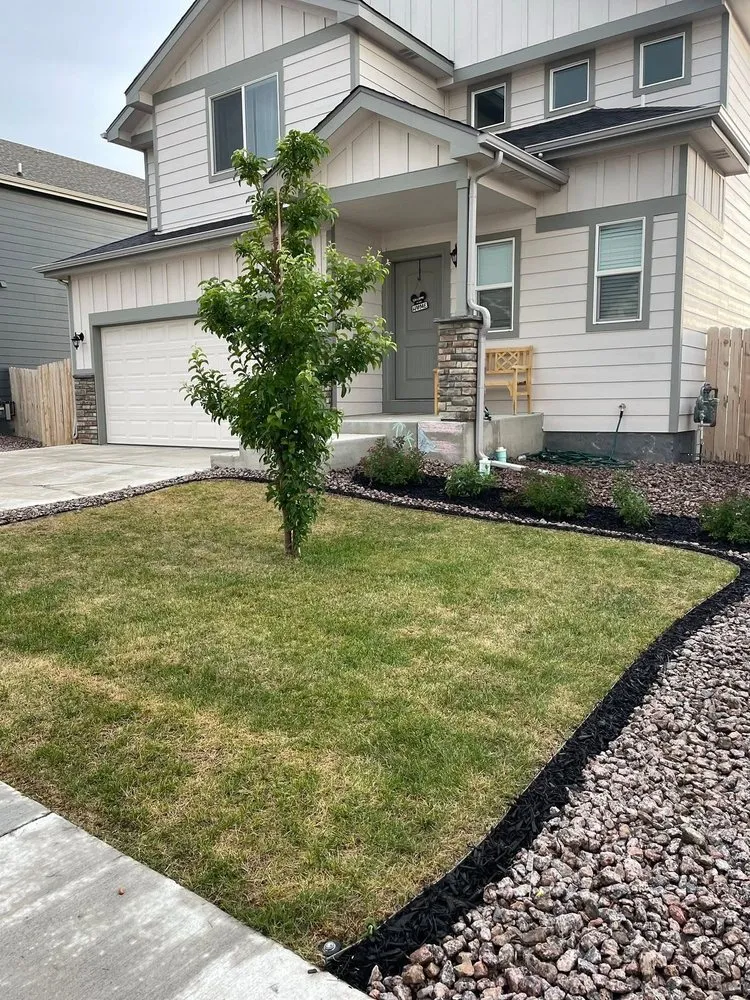 Custom landscape design for year-round maintenance in Colorado Springs, CO by This And That
