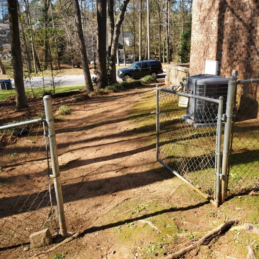 Affordable landscape design for homes in Lilburn, GA by Thomas Affordable Lawn Care