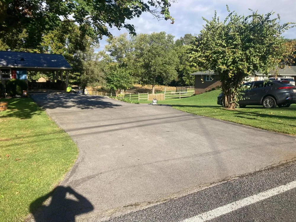 Affordable lawn mowing service with custom design in Clear Spring, MD by Thomas Austin Asphalt Maintenance