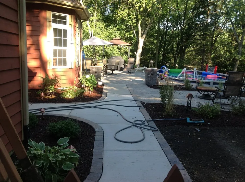 Professional yard cleanup service with custom design across Kenosha, WI - Thomas Concrete & Landscape
