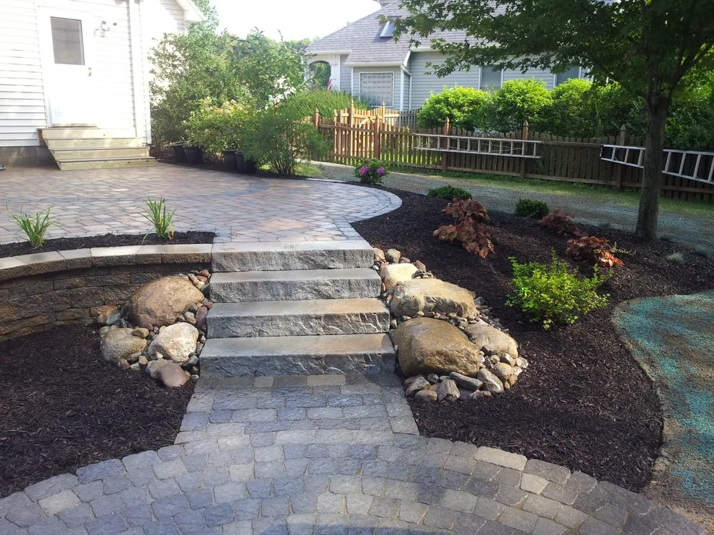 Professional lawn care service for homes across Webster, NY - Thomas Landscape & Design
