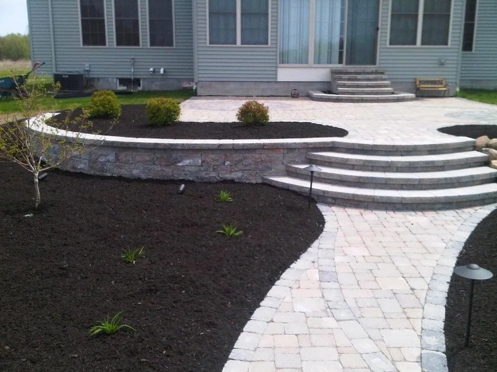 Reliable lawn mowing service for outdoor upgrades across Webster, NY - Thomas Landscape & Design