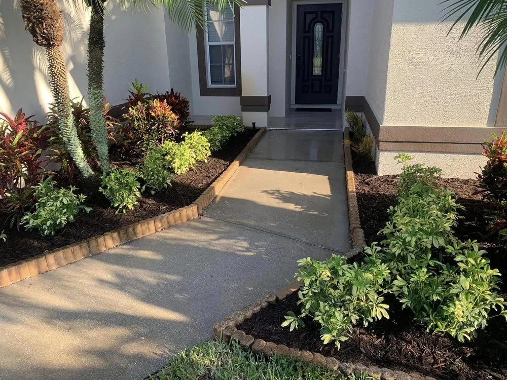 Trusted lawn mowing service with custom design in Bonita Springs, FL by Thomsen & Sons Landscaping