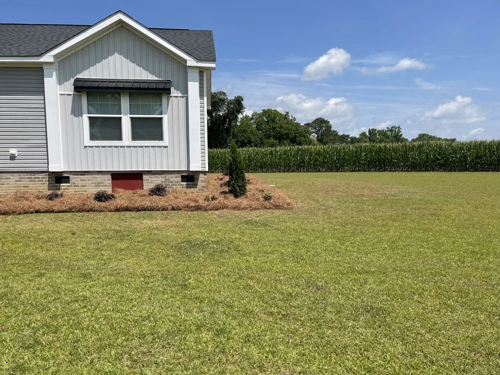 Custom residential landscaping in Lumberton, NC by Thorndyke Lawncare and Landscaping